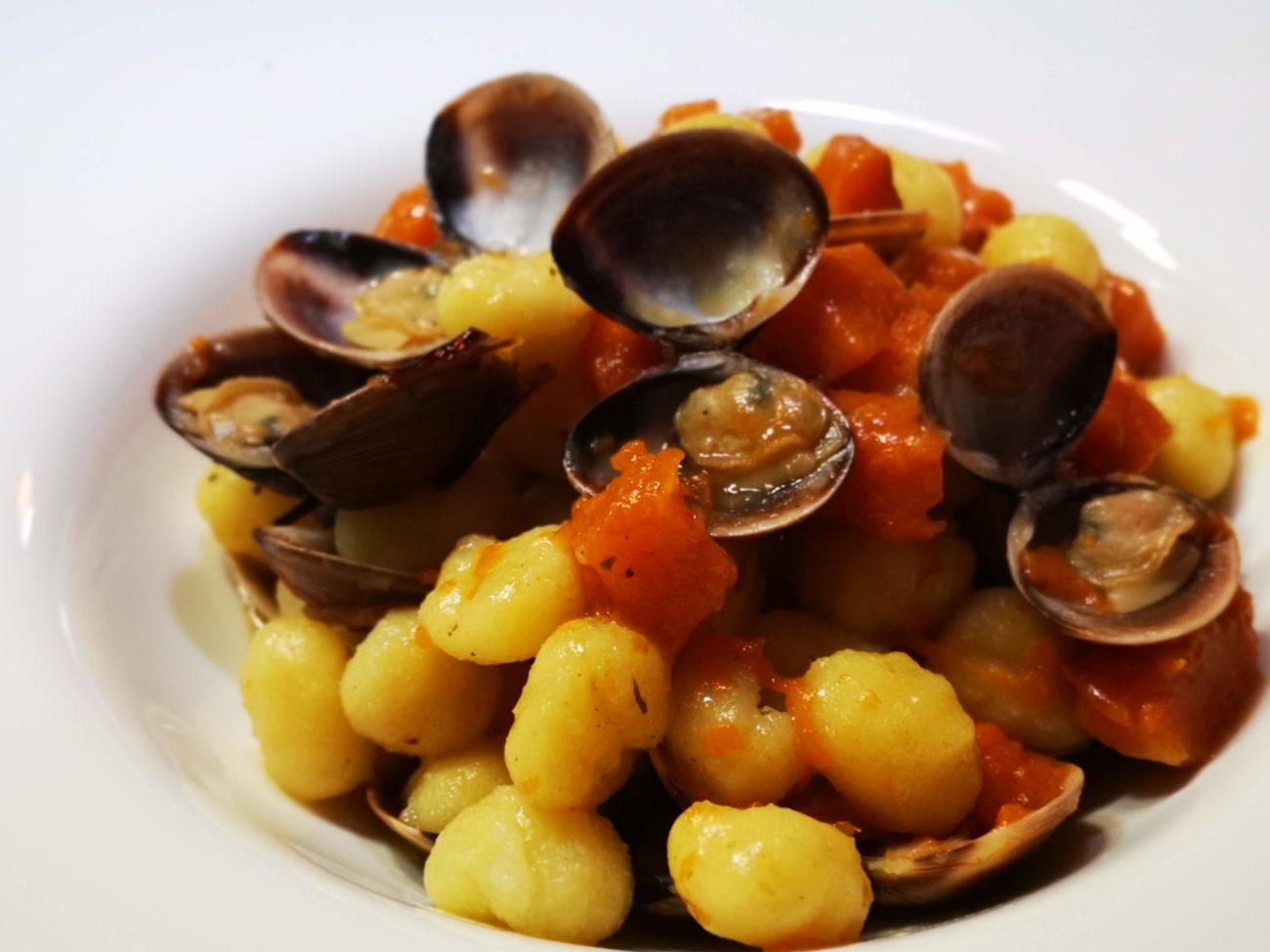 Gnocchi fatti in casa con zucca e vongole veraci